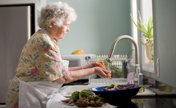 old woman preparing food