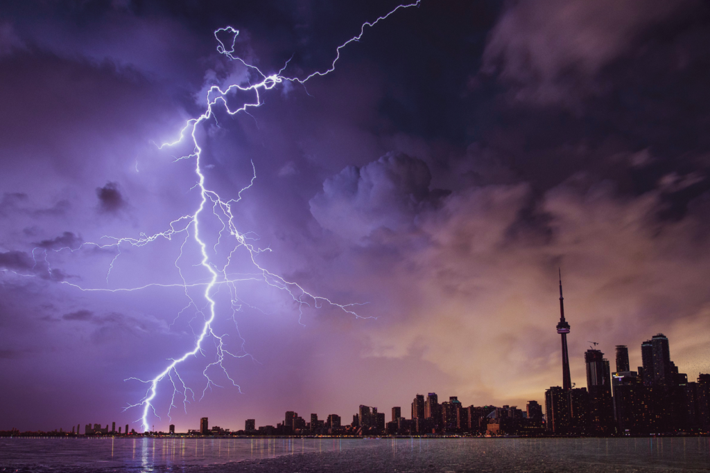 Lightning and thunder near a city