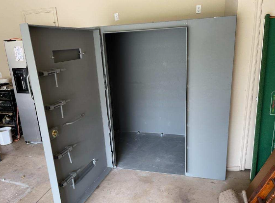 Steel safe room with an open door.