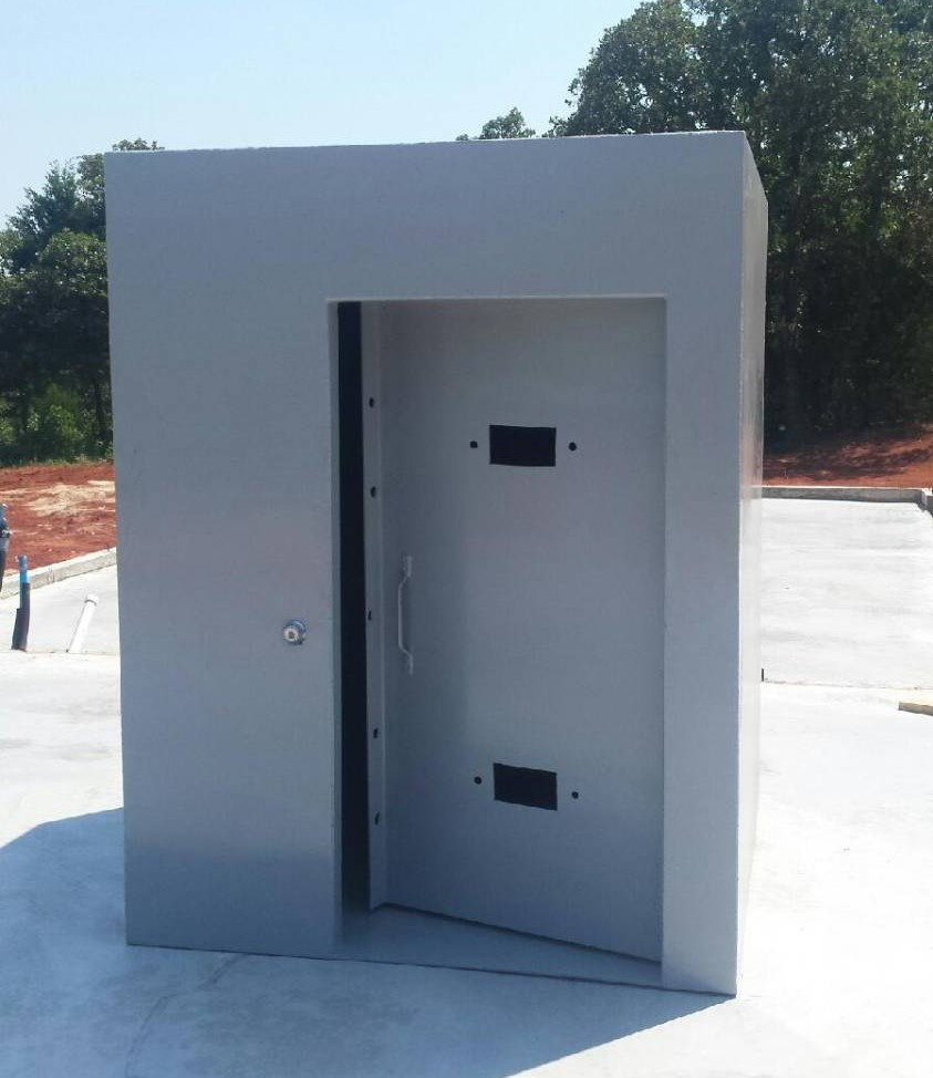 An above-ground storm shelter room placed outside